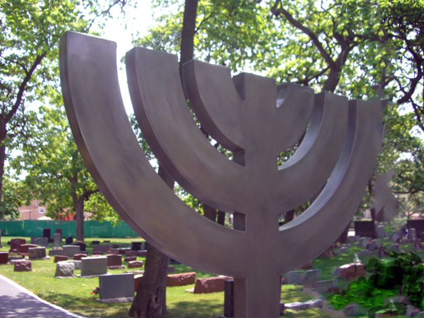 Photo of large menora sculpture at New Light Cemetery in Lincolnwood, IL