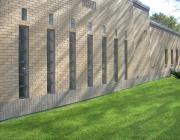 Seven candle-shaped windows at New Light Cemetery Mander Chapel building